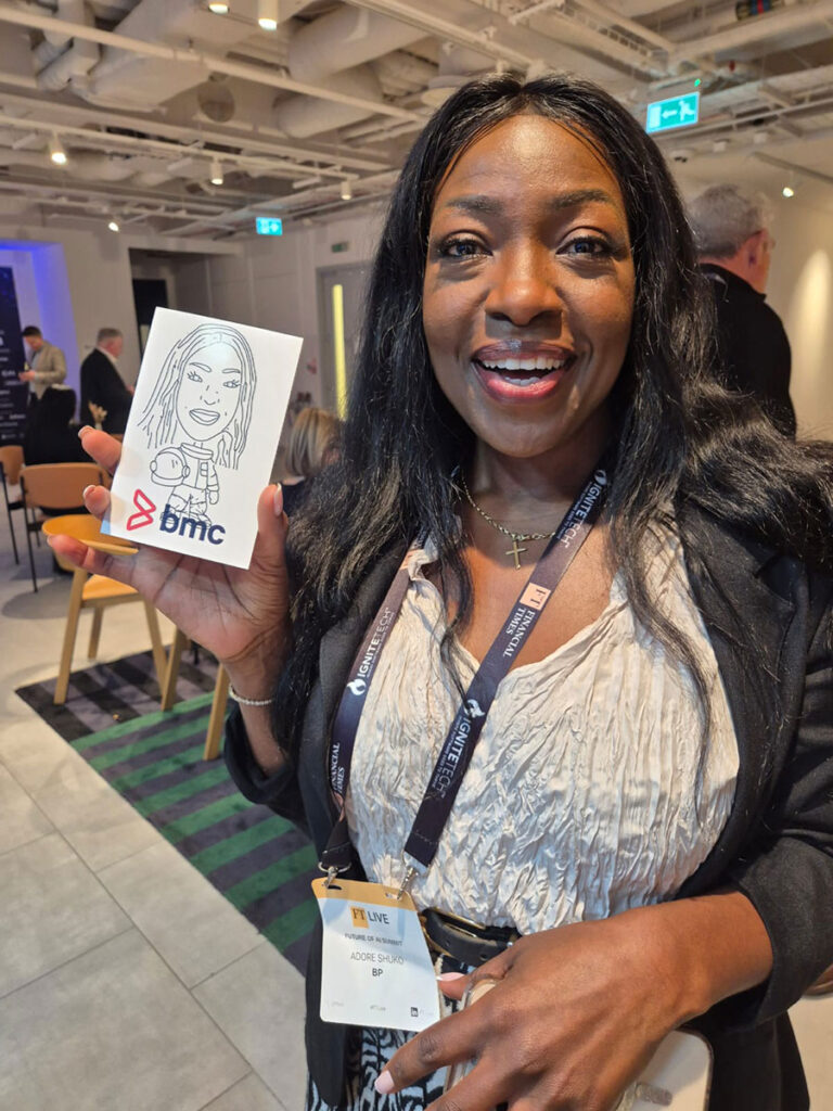 AI sketch robot drawing completed portrait for a guest at the BMC trade show stand